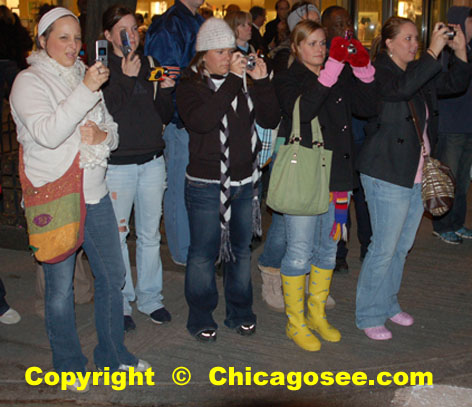 Girls with cellphones shooting demonstration, Chicago