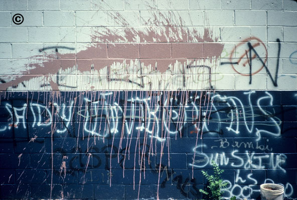 Chicago gang grafitti splattered with paint