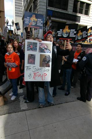 Chicago Abu Ghraib protest demonstrator with photos