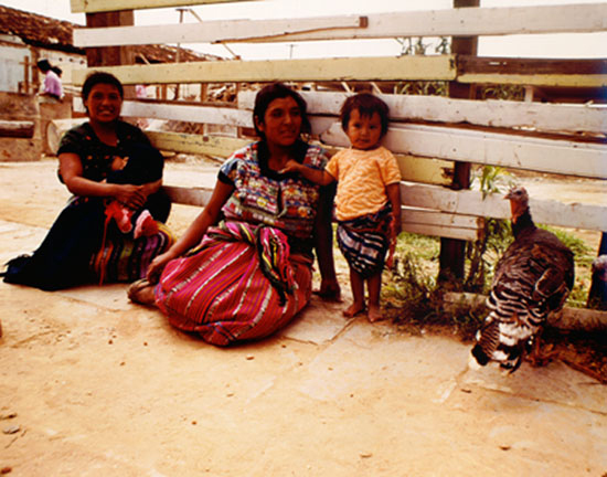 Guatemala woman and child with a turkey
