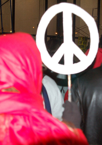 Peace sign carried at Chicago antiwar demonstration, 2007
