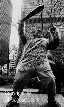 War Lord Bush with Club caricature at Chicago protest, 2003