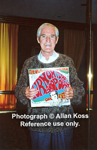 Timothy Leary holding record album, "Turn on, Tune in, Drop out."