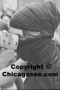 Woman photographer, disguised at Protest rally, Chicago