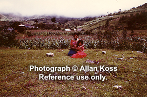 Guatemalan children cuddling on mountain top