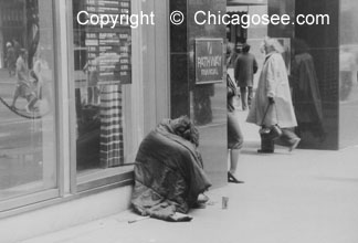 Homeless beggar by Chicago Bank