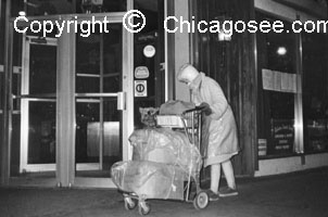 Homeless Woman in Winter walks Chicago streets