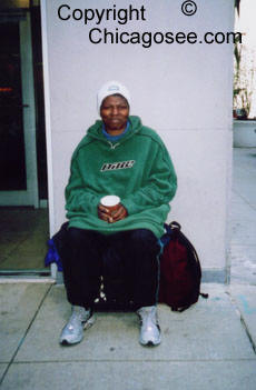 Homeless woman begging, Chicago, April 2007
