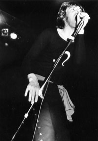 Mick Jagger at microphone, Gimmie Shelter tour, Chicago, 1969
