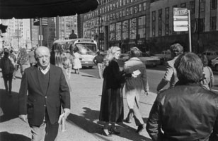 Fur coat model handing out plugger on Michigan Avenue, Chicago, 1988