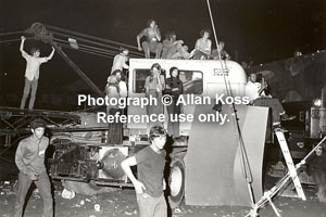 Woodstock, backstage derrick with revelers on top